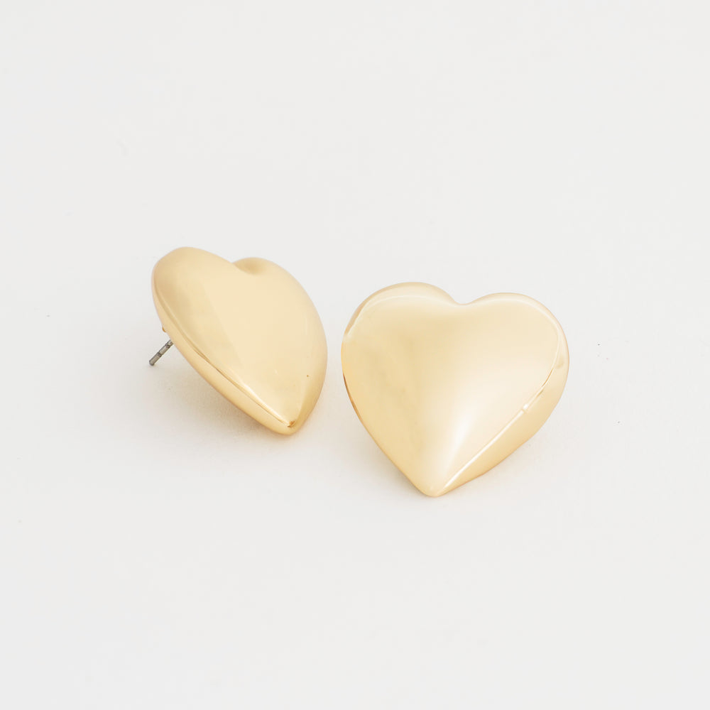 Embrace your journey with the 'Listen to Your Heart Studs.' These elegant heart-shaped earrings symbolize love, courage, and self-expression. Meticulously crafted, each stud serves as a reminder to follow your inner voice and stay true to your path. Whether adding a touch of sparkle to your everyday look or dressing up for a special occasion, these studs offer a perfect blend of beauty and meaningful inspiration.