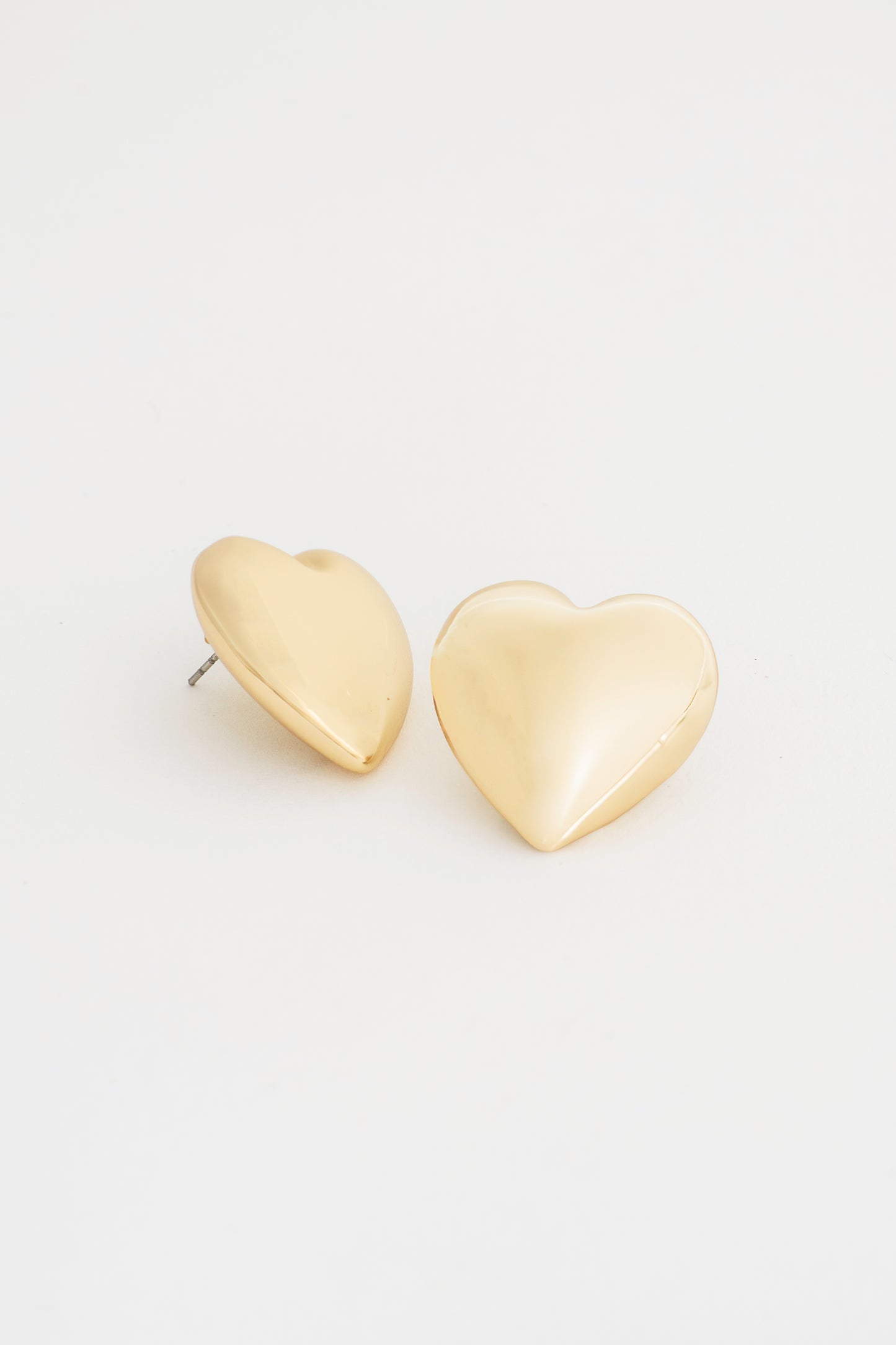 Embrace your journey with the 'Listen to Your Heart Studs.' These elegant heart-shaped earrings symbolize love, courage, and self-expression. Meticulously crafted, each stud serves as a reminder to follow your inner voice and stay true to your path. Whether adding a touch of sparkle to your everyday look or dressing up for a special occasion, these studs offer a perfect blend of beauty and meaningful inspiration.